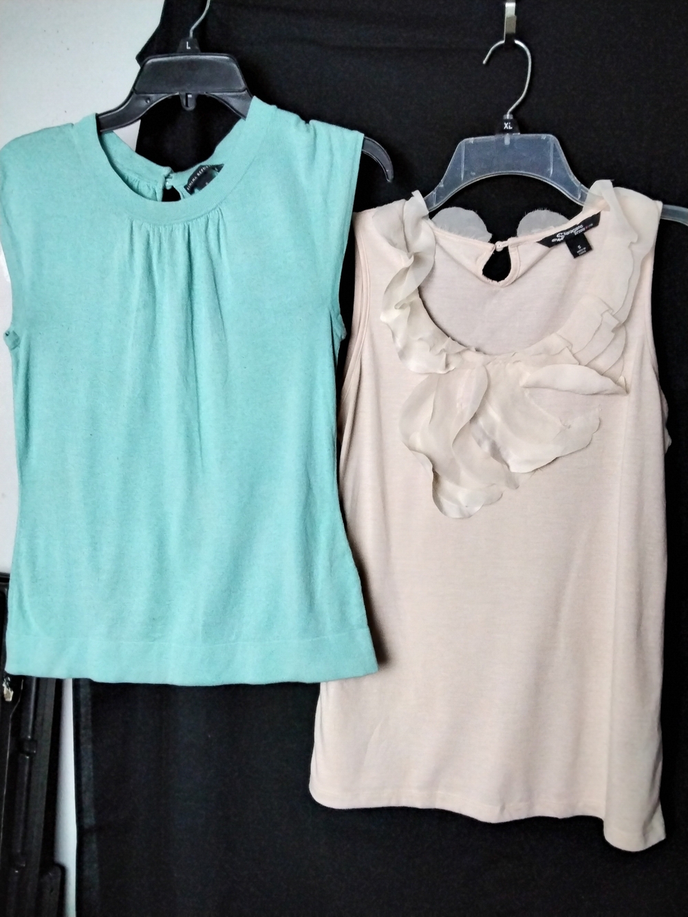 Pair Of Sleeveless Tank Tops
